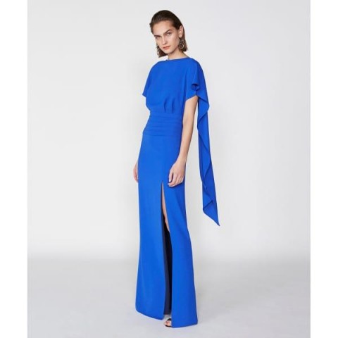 Blue Monterose Dress by Outline | Wolf & Badger | Detailed with a square-cut draped sleeve detail and floor-sweeping length, the Monterose maxi dress is your shortcut to instant glamour
