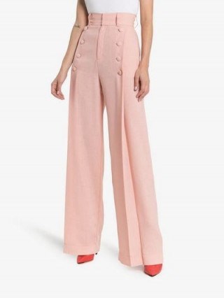 Matériel High-Waisted Button Detail Trousers in pink | retro flares - flipped