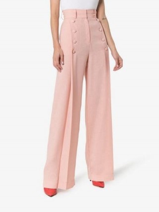 Matériel High-Waisted Button Detail Trousers in pink | retro flares