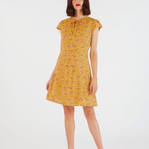 POSEY DOBBY TEA DRESS | Cath Kidston | made from textured crepe fabric with a form-fitting shape that fastens with a back zip and is finished with a tie keyhole neckline, delicate lace trim and frill cap sleeves