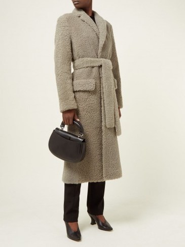 Matches Fashion THE ROW Muto belted shearling coat - flipped