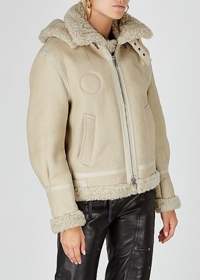 CHLOÉ Cream logo-print shearling jacket | luxe jackets with style - flipped