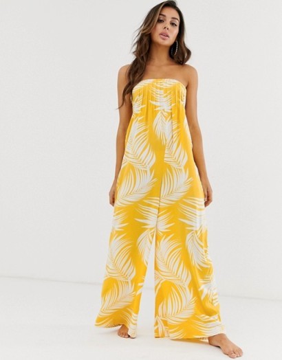 ASOS DESIGN bandeau beach jumpsuit with shirring in yellow palm outline print | poolside glamour