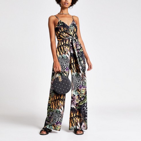 RIVER ISLAND Black mixed print knot front jumpsuit.