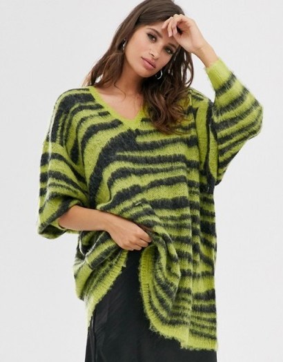Religion oversized jumper in zebra lime green | slouchy knits - flipped