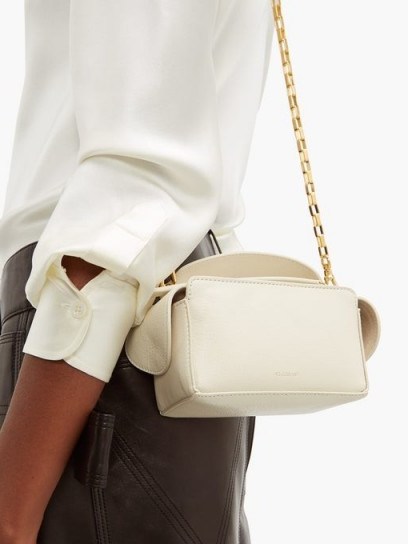 WANDLER Yara mini leather cross-body bag in white | small luxe handbag - flipped