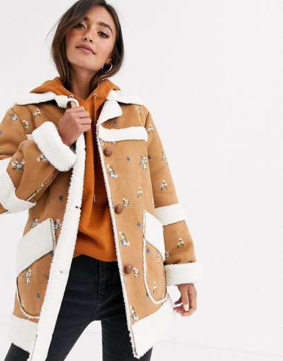 ASOS DESIGN suedette jacket with floral embroidery in tan – borg trimmed jackets