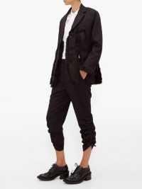 NOIR KEI NINOMIYA Ruched-cuff cropped wool trousers in black | side gathered pants