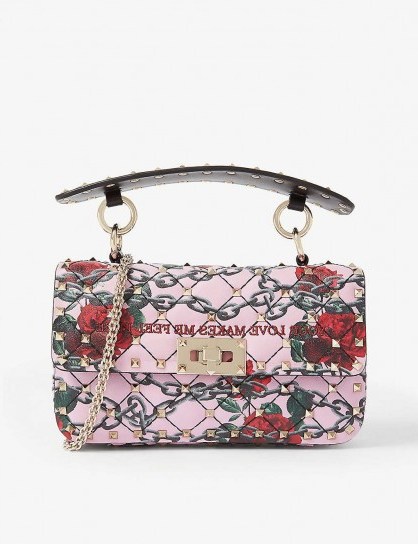 VALENTINO Rockstud Spike leather shoulder bag with ‘Your Love Makes Me Feel Free’ embroidered slogan in Macaron - flipped