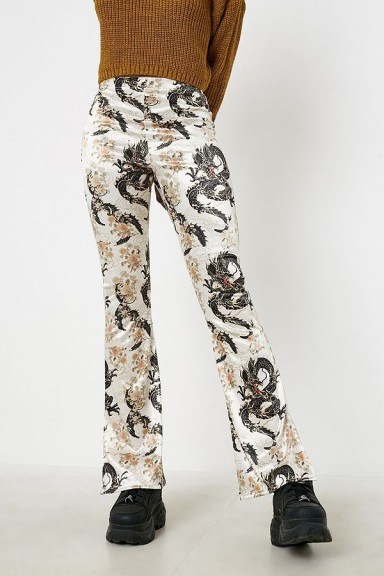 UO Dragon Print Champagne Satin Flare Trousers in Cream - flipped