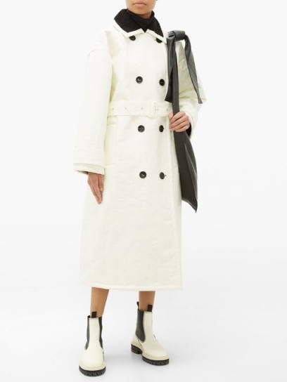 STAND STUDIO Marissa coated-canvas faux-fur lined trench coat in white / chic winter coats