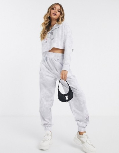 ASOS DESIGN tracksuit raw hem sweat / jogger in tie dye with placement print in grey