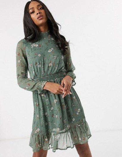 Vero Moda shift dress with high neck and ruffle hem in green floral - flipped