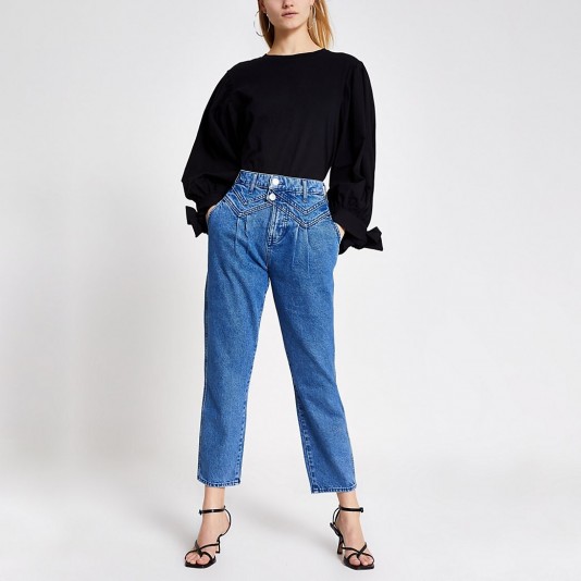 River Island Blue double button slim tapered leg jeans | front stitch detail
