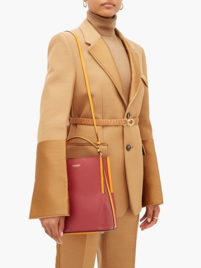 BURBERRY Peggy leather bucket bag in burgundy and orange