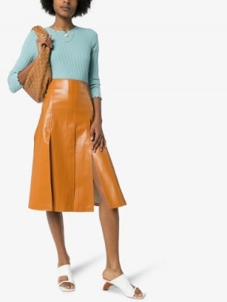 A.W.A.K.E. Mode Vegan Leather Midi Skirt in caramel-brown | front split details