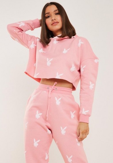 playboy x missguided pink bunny repeat print cropped hoodie / logo printed hoodies - flipped