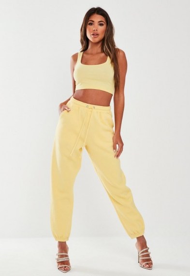 MISSGUIDED yellow oversized 90’s joggers - flipped