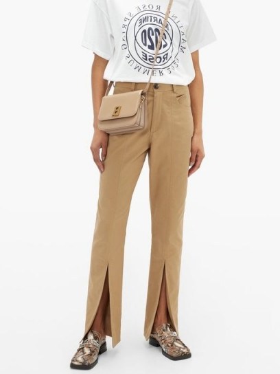MARTINE ROSE Front-slit cotton-twill trousers in beige - flipped