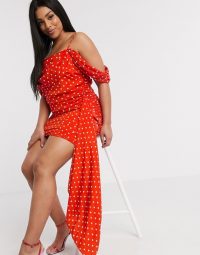 In The Style Plus x Jac Jossa exclusive drape off shoulder ruched mini dress with train detail in red polka print / glamorous evening look