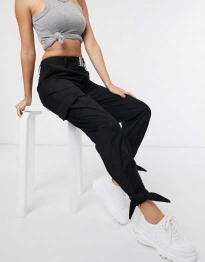 NA-KD ankle-tie cargo trousers in black - flipped
