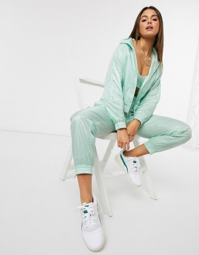 Puma Evide track set in green – sports jackets & jogger sets - flipped