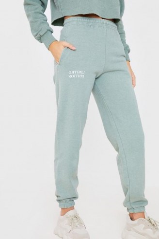SHAUGHNA PHILLIPS SAGE WASHED ‘LIMITED EDITION’ SLOGAN JOGGING BOTTOM ~ green joggers - flipped