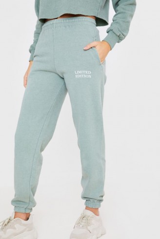 SHAUGHNA PHILLIPS SAGE WASHED ‘LIMITED EDITION’ SLOGAN JOGGING BOTTOM ~ green joggers