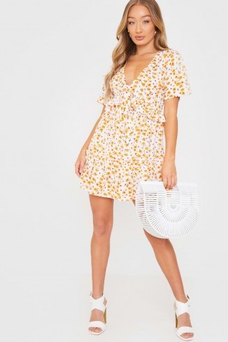 In The Style WHITE AND ORANGE FLORAL TIE FRONT FRILL MINI DRESS - flipped