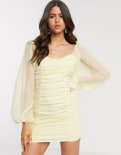 ASOS DESIGN ruched bodycon mini dress with balloon sleeves in lemon yellow dobby