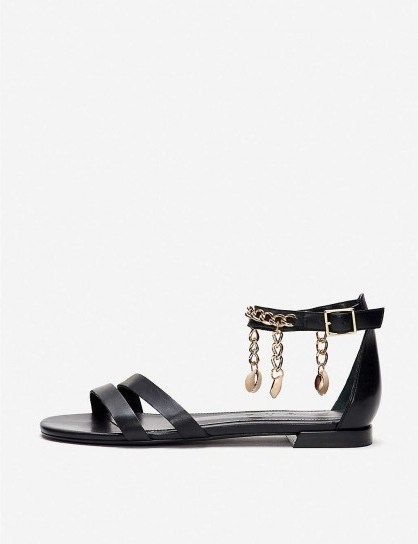 CLAUDIE PIERLOT Chain and shell-embellished leather sandals in black - flipped
