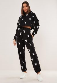 playboy x missguided black repeat print oversized joggers / printed jogging bottoms