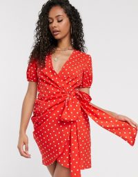 PrettyLittleThing tea dress with tie side and puff sleeve in red polka