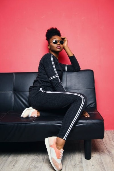 Dark navy track suit, sunglasses and peach trainers – ultimate style