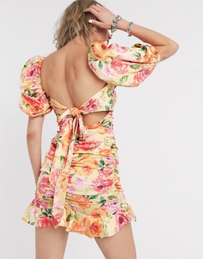 For Love and Lemons Versilla mini dress with bow back in pink floral print / tie back dresses
