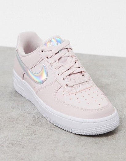 Nike Air Force 1 ’07 trainers in pink with iridescent swoosh - flipped