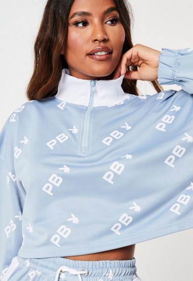 playboy x missguided blue repeat print zip through cropped sweatshirt / crop hem sweat top / bunny logo prints / bunnies