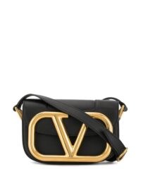 Vanessa Hudgens black and gold V logo cross body, Valentino Garavani small Supervee crossbody bag, out in Los Angeles, 22 July 2020 | celebrity street style bags | accessories