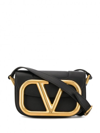 Vanessa Hudgens black and gold V logo cross body, Valentino Garavani small Supervee crossbody bag, out in Los Angeles, 22 July 2020 | celebrity street style bags | accessories