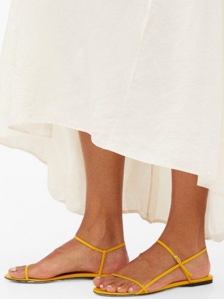 THE ROW Bare leather sandals in yellow / barely there flats