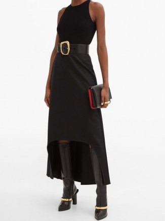 ALEXANDER MCQUEEN Dip-hem wool skirt in black / contemporary fashion / high low skirts - flipped