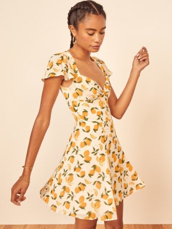 Reformation Kenni Dress in Lemonade | fruit prints | lemon print fit and flare dresses | plunge front neckline - flipped