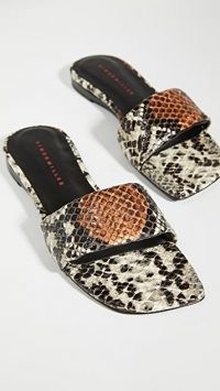Kyle Richards snake print flats, Simon Miller Hammer Slides, on Instagram, 28 August 2020 | celebrity social media style | reality star footwear