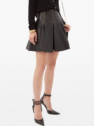 VERSACE Zip-embellished pleated leather mini skirt in black ~ luxe pleat detail skirts - flipped