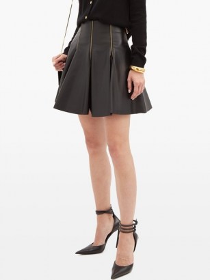 VERSACE Zip-embellished pleated leather mini skirt in black ~ luxe pleat detail skirts