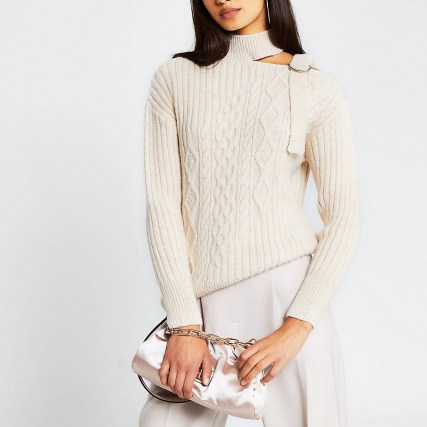 Cream choker neck cable knitted jumper | neutral cut out jumpers | on trend knitwear