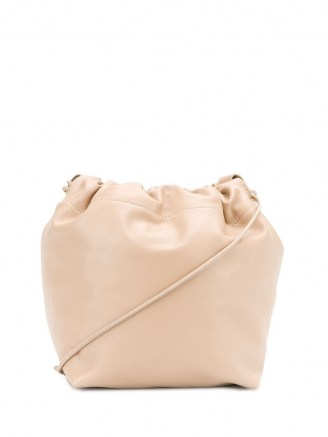 Jil Sander drawstring crossbody bag in beige leather / luxe bags - flipped