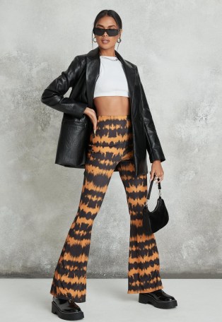 MISSGUIDED orange tie dye ribbed jersey flare trousers / printed flares - flipped