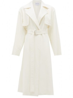MICHELLE WAUGH The Carina oversized cotton-blend trench coat in ivory white | chic belted coats