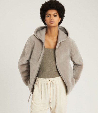 Reiss AMELIA REVERSIBLE SHEARLING HOODED COAT PALE GREY – casual luxe coats – luxury front zip jackets